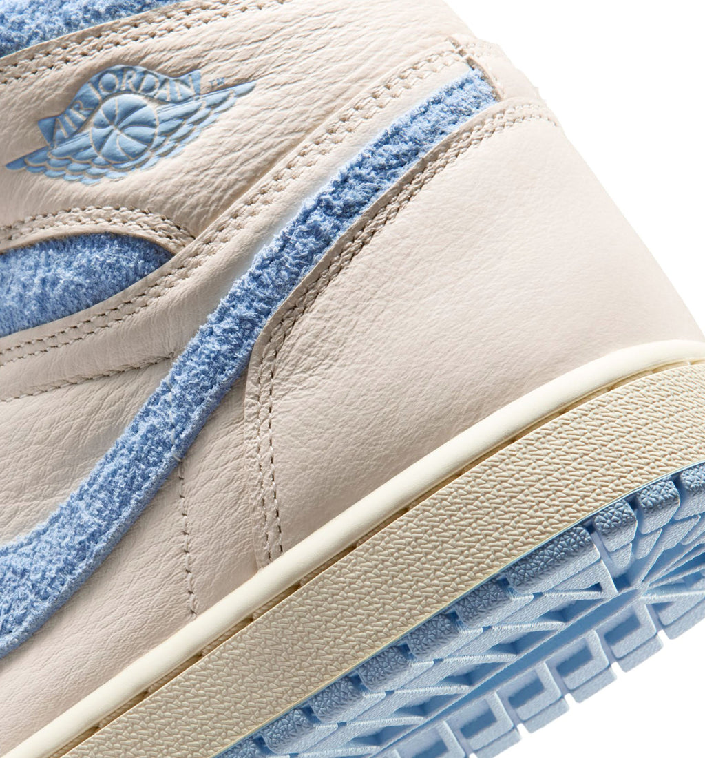 Air Jordan 1 Retro High OG Women’s Lifestyle Shoe – Pale Ivory/Psychic Blue/Coconut Milk